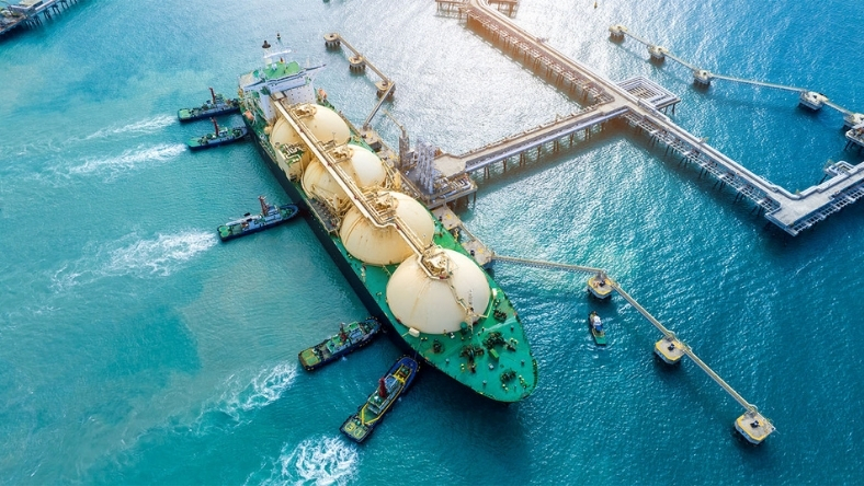 Aerial view of LNG tanker moored at the marine gas export terminal