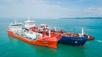 Two LNG vessels alongside each other offshore during fuel transfer operations